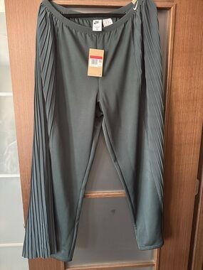Nike Women's Wide Leg Pants in Dark Green with Pleated Side Panels